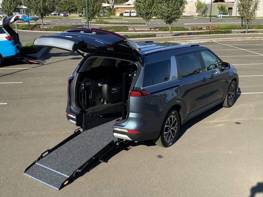 Our wheelchair-accessible Kia van with rear ramp